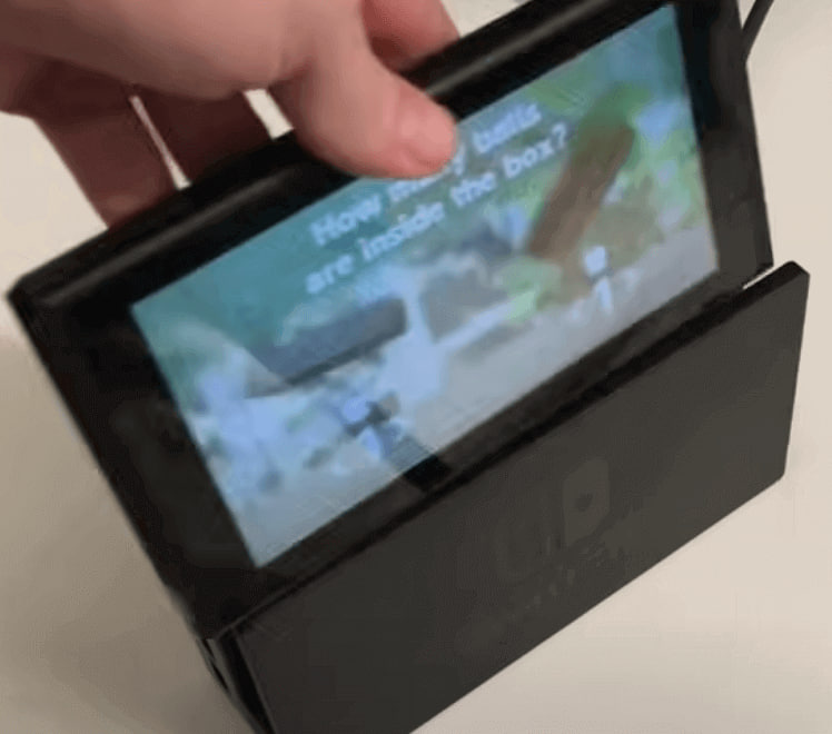 Activa la Switch e insértala en la dock