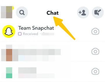 Tap the "Chat" icon at the bottom of the screen.
